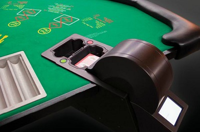 iDEAL automatic shuffler installed on a Three Card Poker table