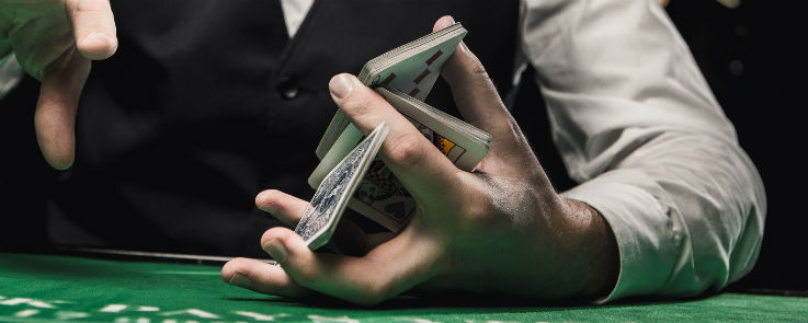 Dealer shuffling cards