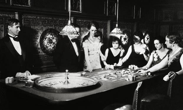 gamblers at the roulette table laying a system
