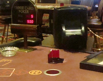 Example of an Ace shuffler on a 3CP table