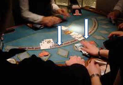 blackjack table with players