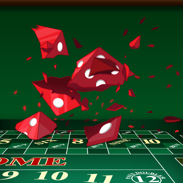 Craps dice smashing into pieces