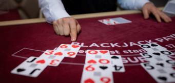 6 to 5 Blackjack: A player is considering her options