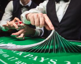 Blackjack table and dealer
