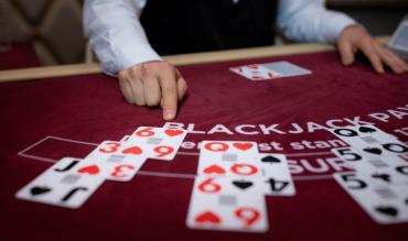 6 to 5 Blackjack: A player is considering her options