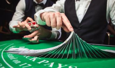 Blackjack table and dealer